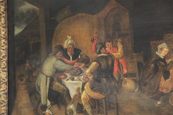 After Teniers Domestic interior with figures around a table and a nursing mother, 14 x 24.5in.